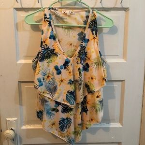 Sleeveless shirt with ruffles